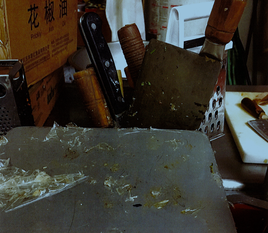 Veggie prep table had dried food debris